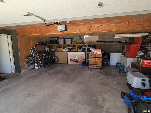 garage featuring a garage door opener