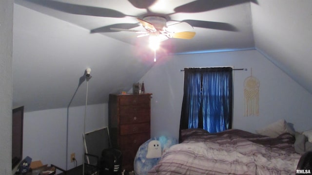 bedroom featuring ceiling fan and vaulted ceiling