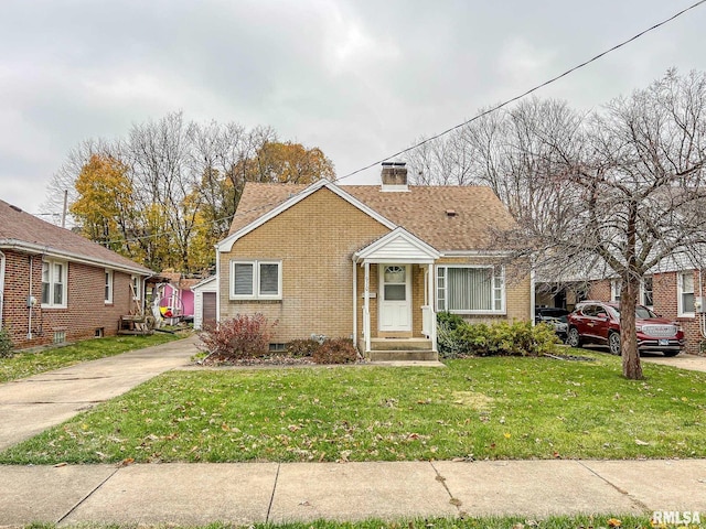 bungalow-style house with a front lawn