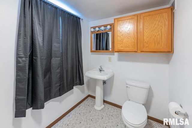 bathroom featuring toilet