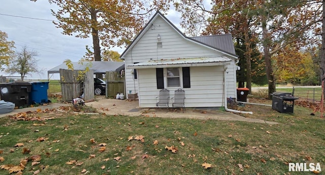 500 E Bancroft St, West Point, IL 62380 - rear view of house featuring metal roof