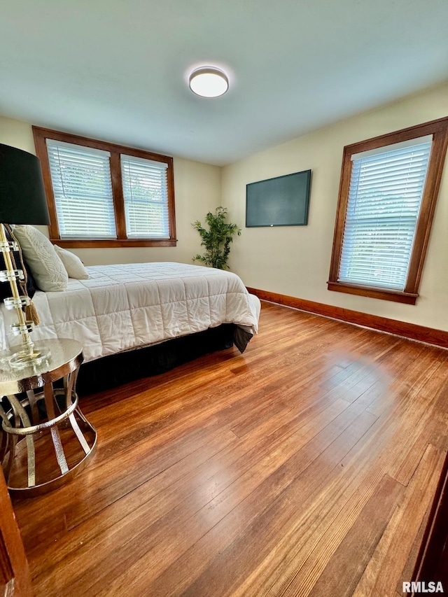 bedroom featuring hardwood / wood-style floors