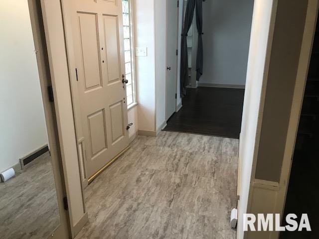 entrance foyer with light hardwood / wood-style floors