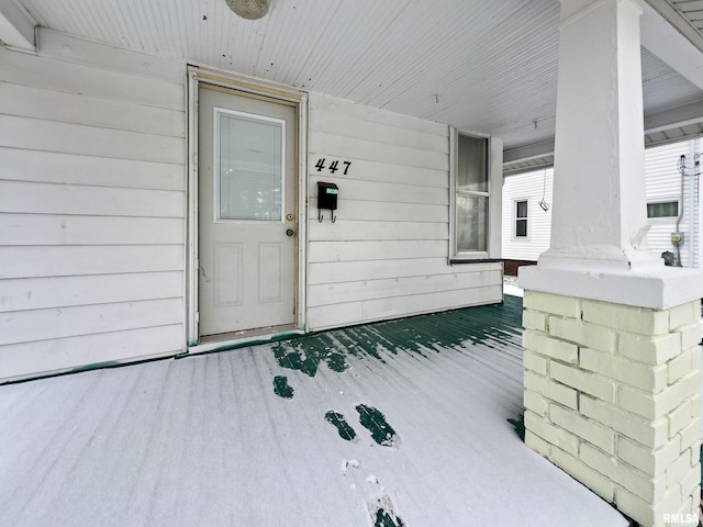 entrance to property with covered porch