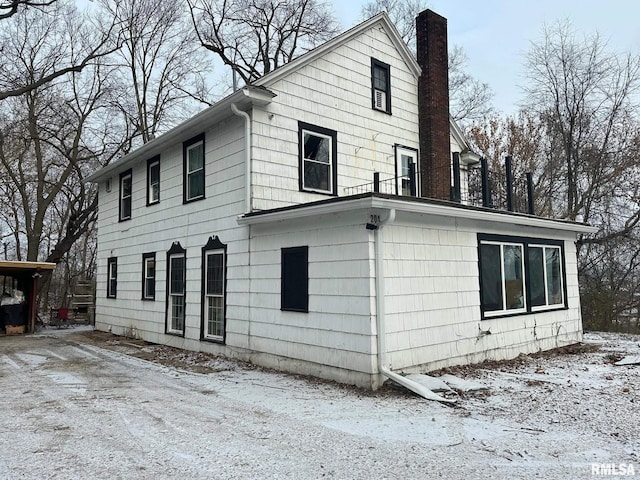 view of snow covered property