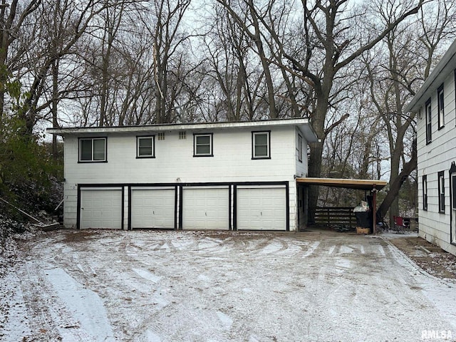 view of snow covered garage