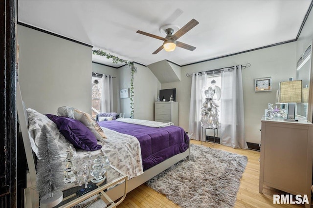 bedroom featuring ceiling fan and light hardwood / wood-style floors