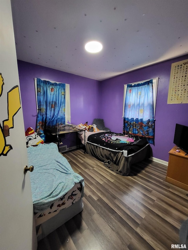 bedroom featuring hardwood / wood-style flooring