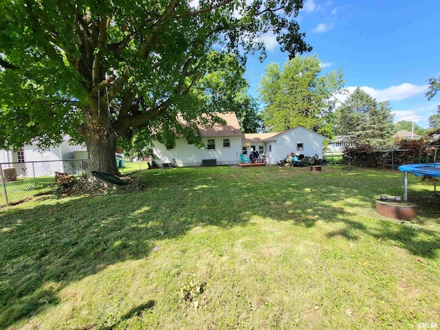 view of yard featuring a trampoline