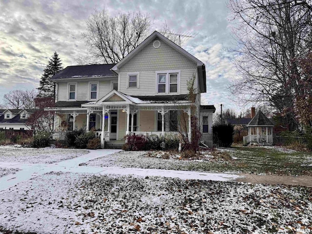 view of front property featuring covered porch