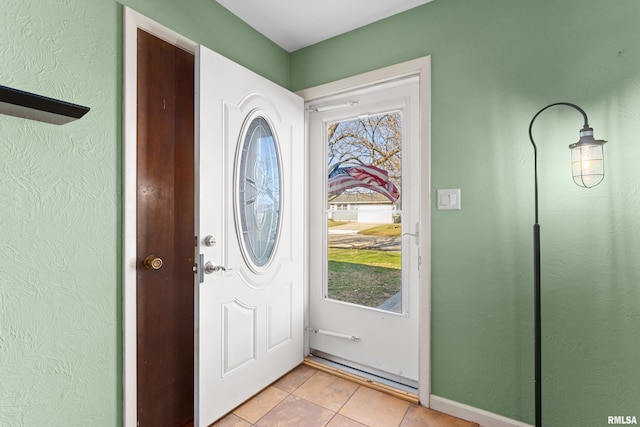 entrance foyer featuring light tile patterned floors