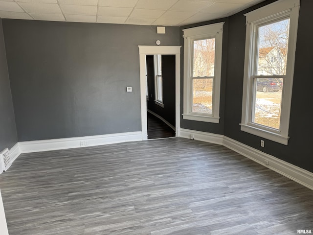 empty room featuring dark wood-type flooring