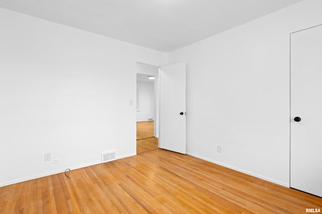 unfurnished bedroom with wood-type flooring