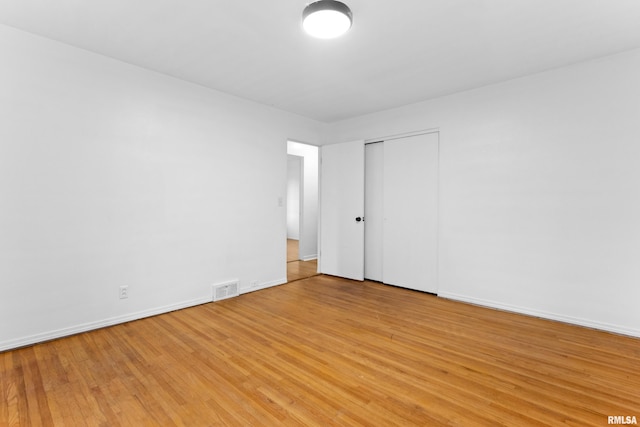 empty room featuring light hardwood / wood-style flooring