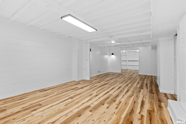 unfurnished room with light hardwood / wood-style floors