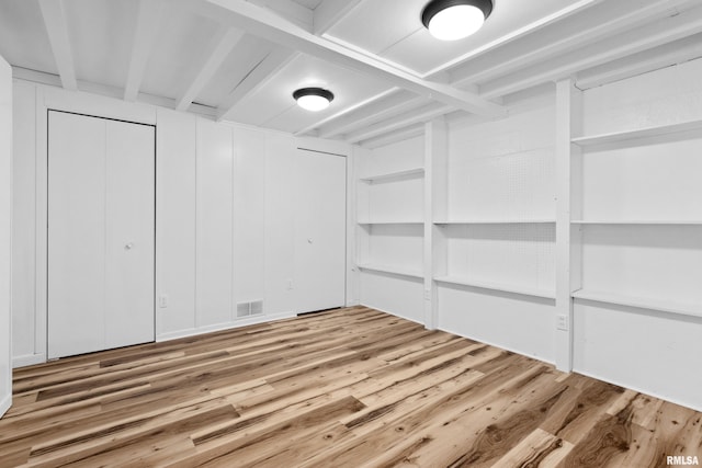 interior space with hardwood / wood-style flooring