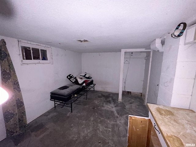 interior space featuring a textured ceiling