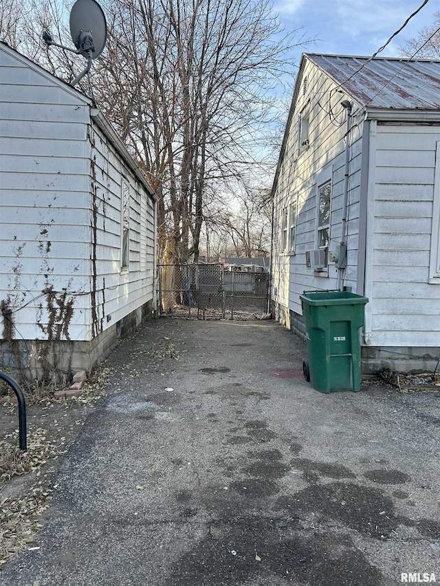 view of side of property featuring cooling unit