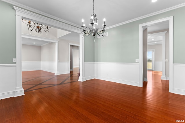 spare room with ornamental molding, recessed lighting, and wood finished floors