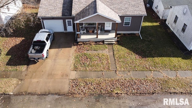 exterior space featuring a porch and a front lawn