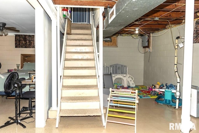 basement featuring ceiling fan