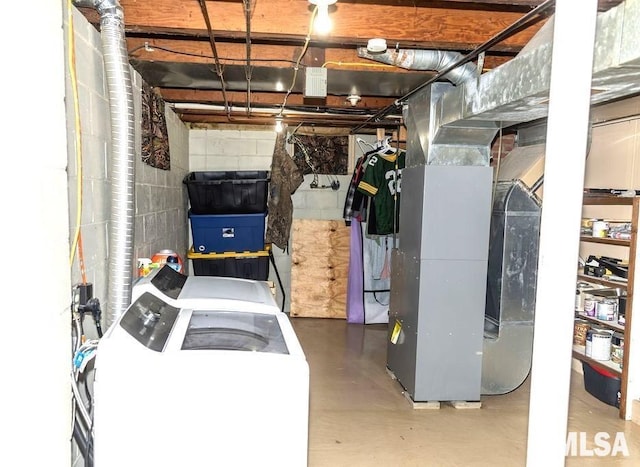 basement featuring washer and dryer