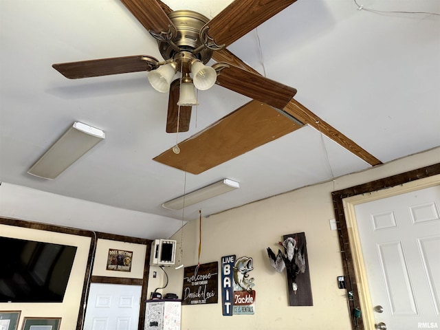 interior details featuring ceiling fan