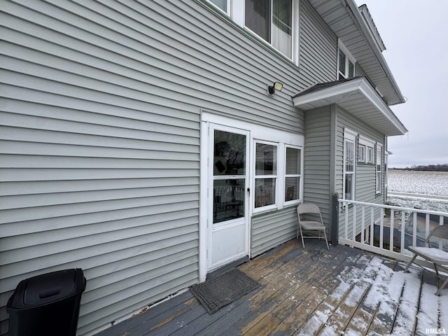 view of snow covered deck