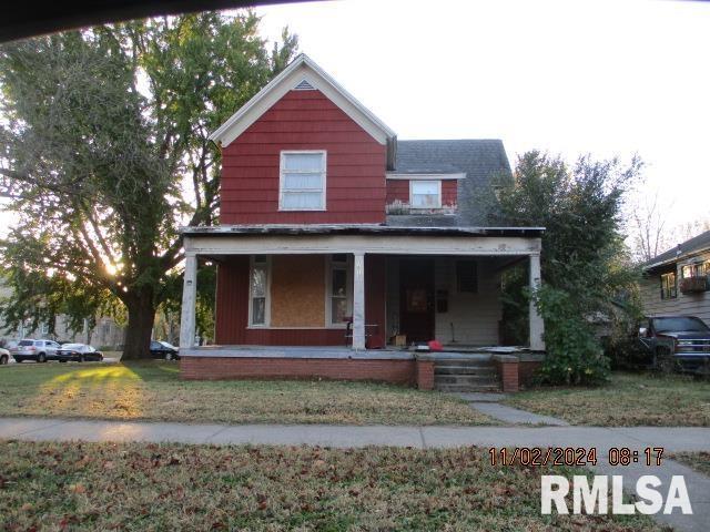 view of front of house with covered porch