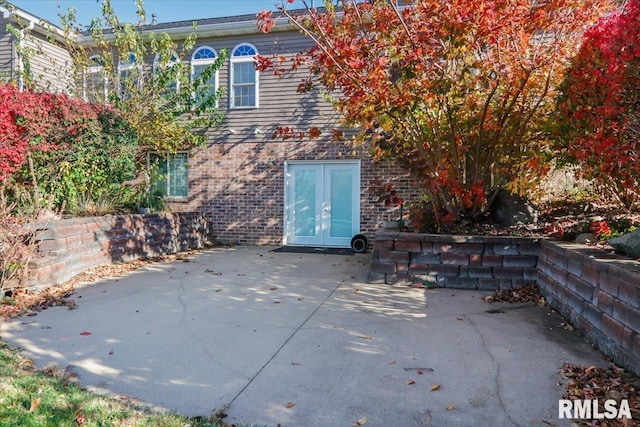 view of patio featuring french doors