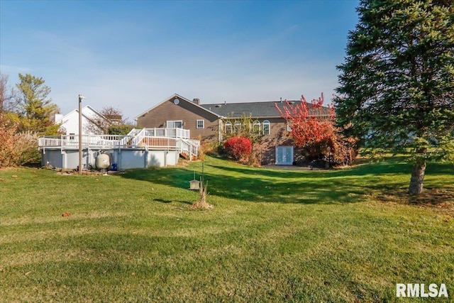 view of yard featuring a swimming pool side deck