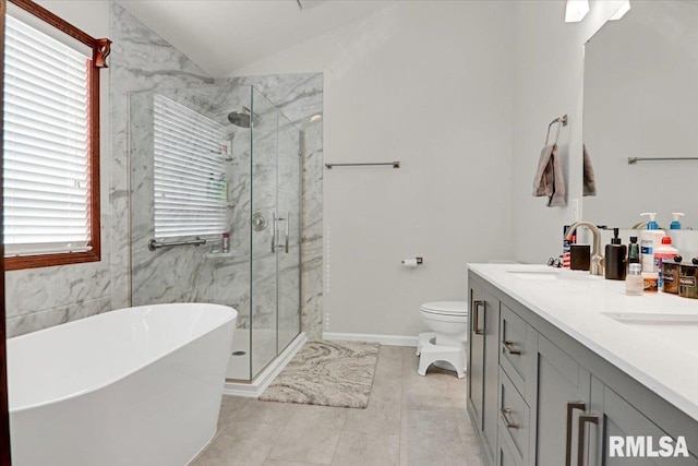 full bathroom with vanity, tile patterned floors, vaulted ceiling, toilet, and shower with separate bathtub