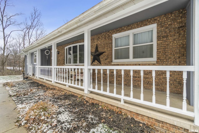 view of property exterior featuring covered porch