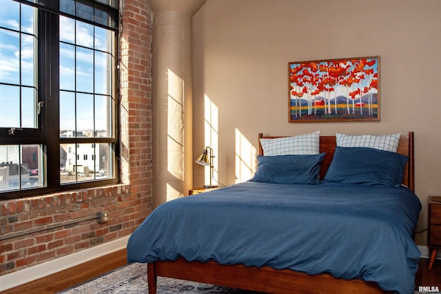 bedroom featuring hardwood / wood-style floors