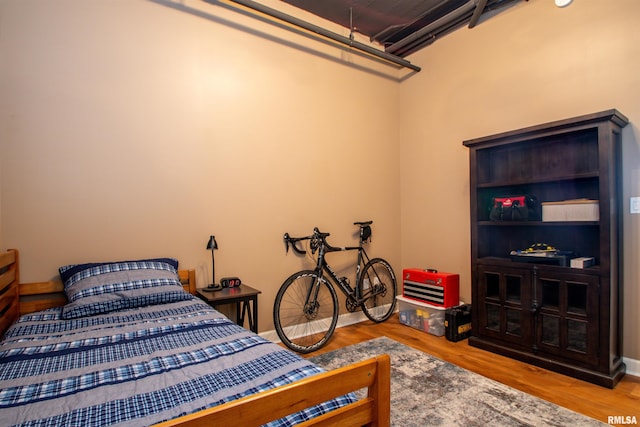 bedroom featuring hardwood / wood-style floors