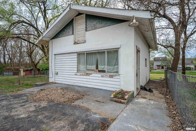 view of front of home with fence