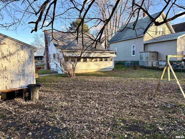 view of yard with central AC