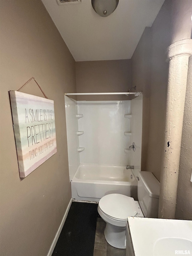 full bathroom with washtub / shower combination, toilet, and vanity