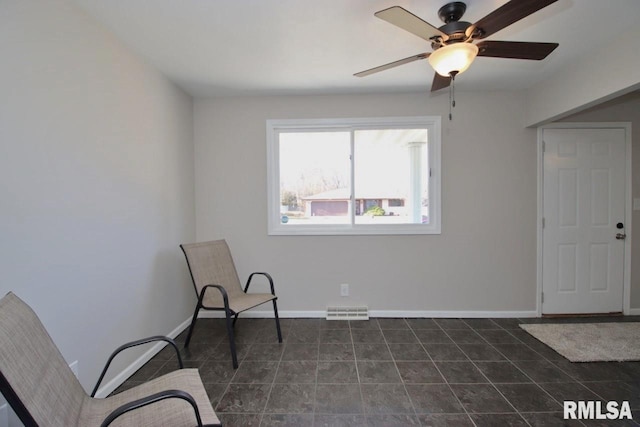 unfurnished room featuring ceiling fan