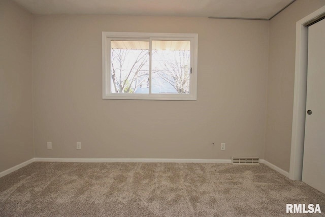 empty room with carpet floors