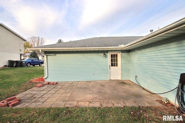 exterior space with a lawn and a patio