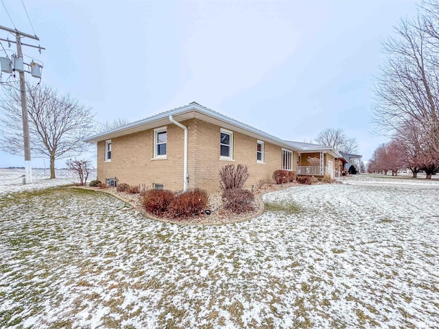 view of snow covered property