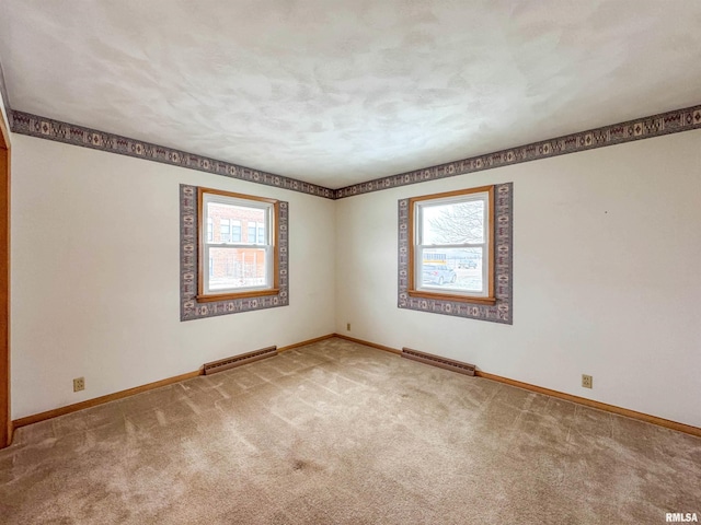 spare room with carpet flooring