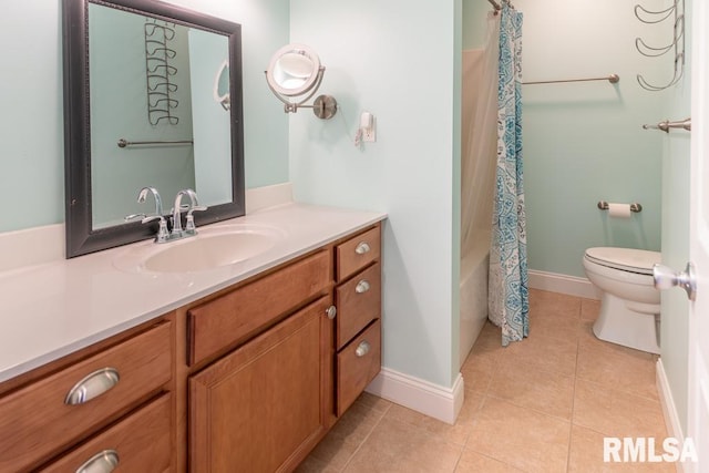 full bathroom featuring tile patterned flooring, vanity, toilet, and shower / tub combo with curtain