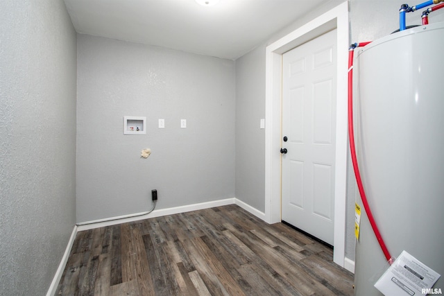 clothes washing area featuring dark hardwood / wood-style floors, hookup for a washing machine, and water heater