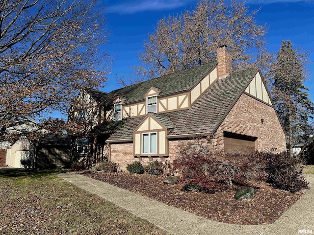 view of side of property featuring a garage