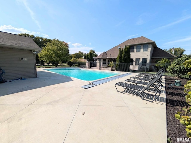 view of pool featuring a patio