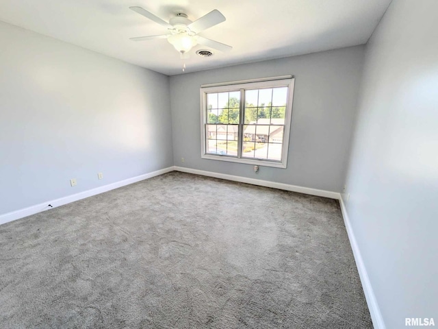 unfurnished room with carpet floors and ceiling fan