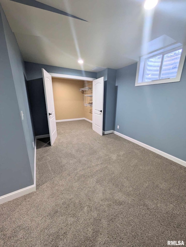 basement with carpet flooring