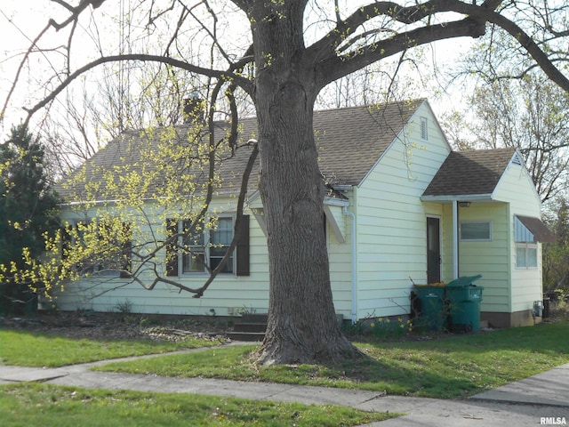 view of property exterior featuring a yard